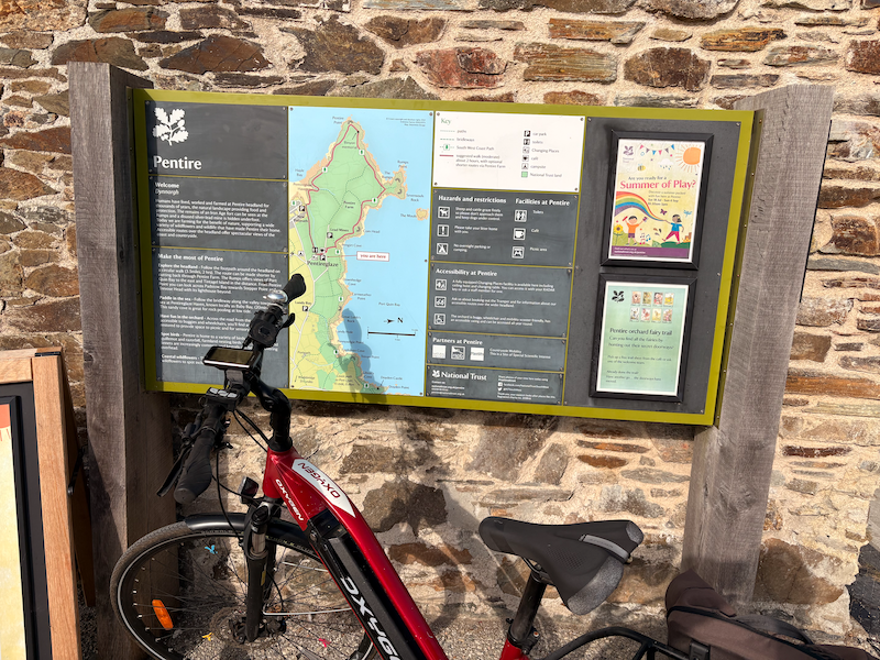 National Trust Pentire noticeboard and map with my bike resting in front of it