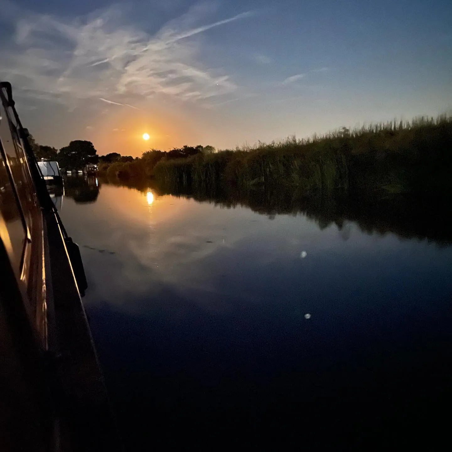 Boat, canal and sunset