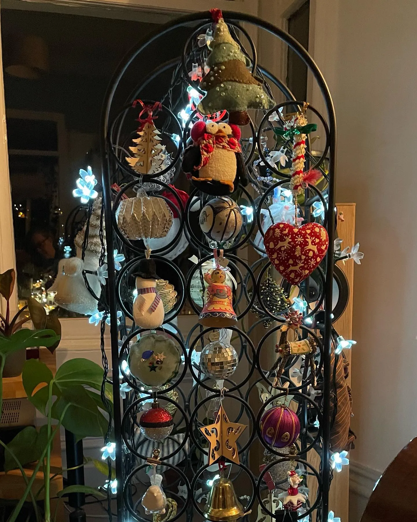 Not a Christmas Tree, it's decorations hung on a wine rack
