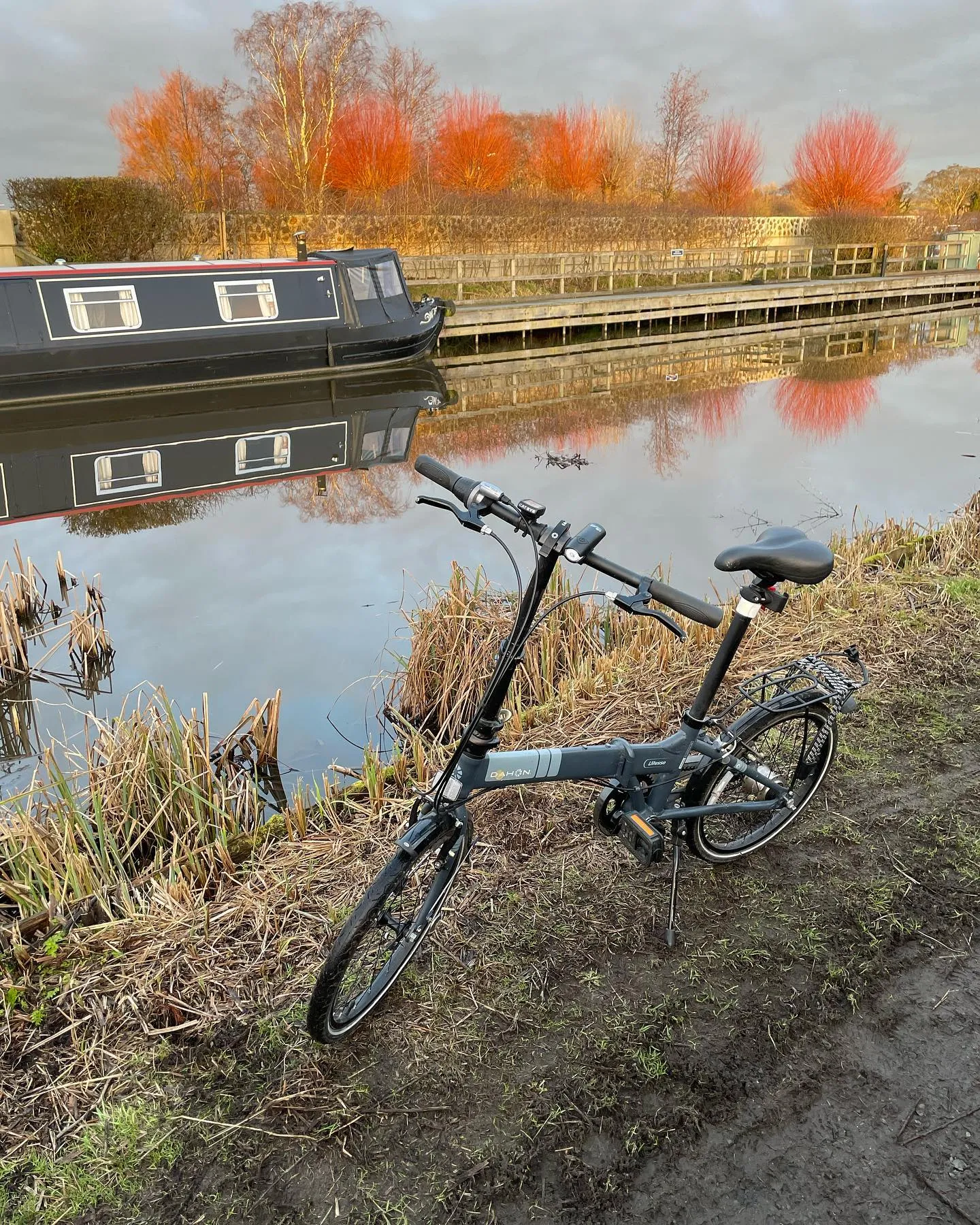Folding bike by a canal