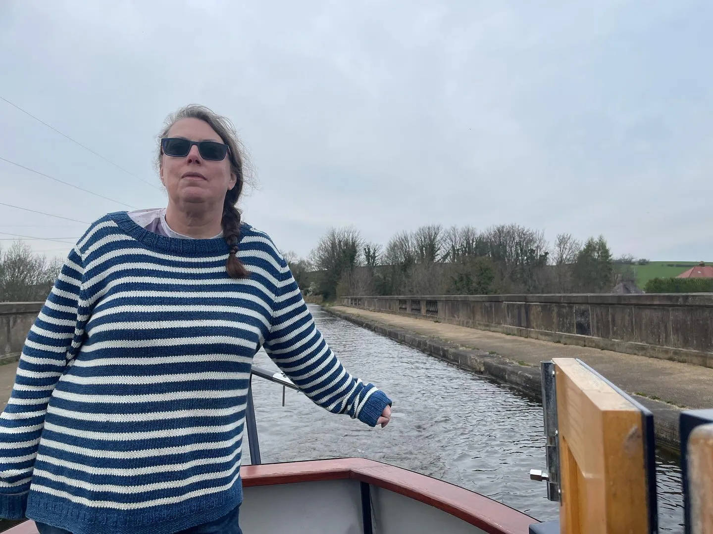 Me driving the boat over the Lune Aquaduct
